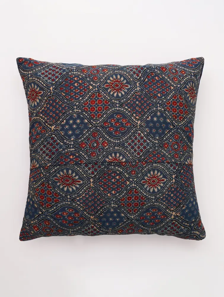 Another view of the cover showing a patterned red and blue face
