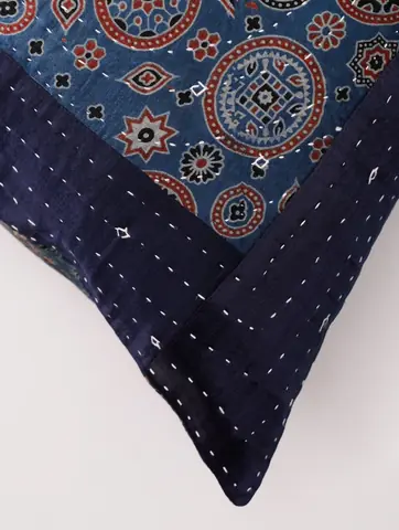 Corner of the cover showing the border stitching