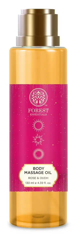 Bottle of Rose and Oudh body massage oil with a pink label
