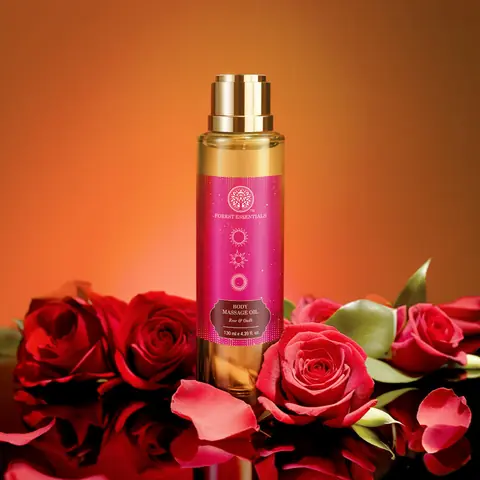 Bottle placed among red roses