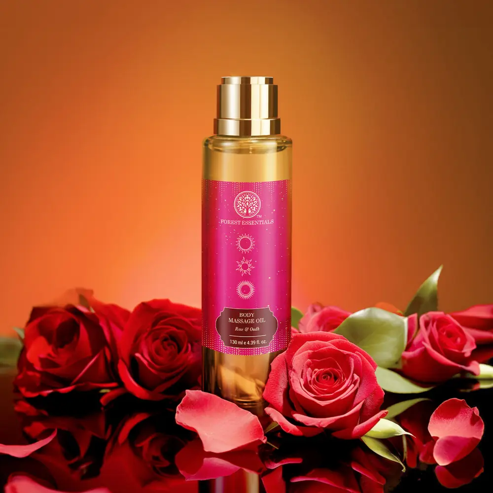 Bottle placed among red roses