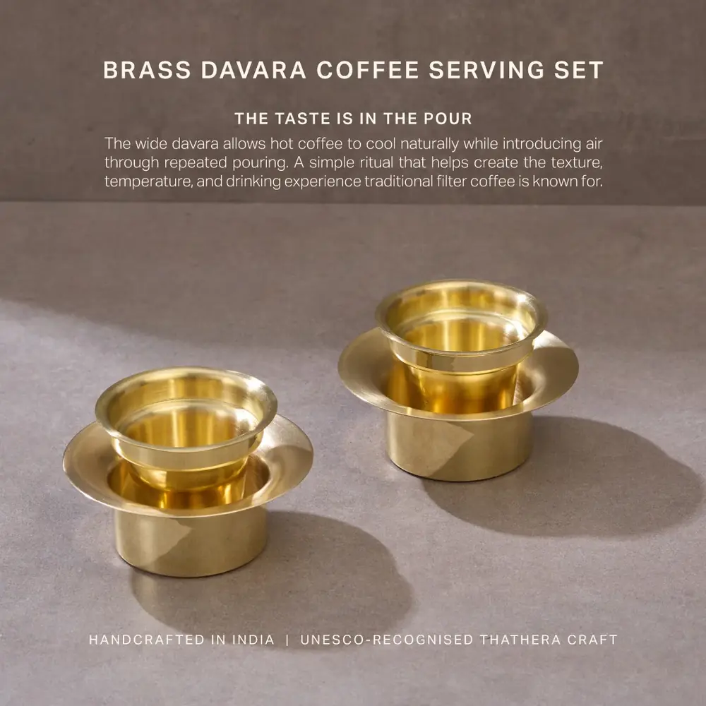 Brass davara and tumbler pair on a brown ground