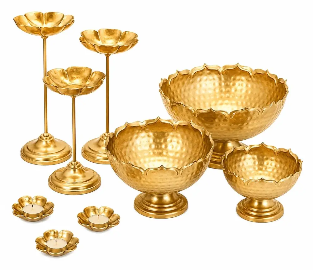 The nine piece Taj urli set arranged on a white ground