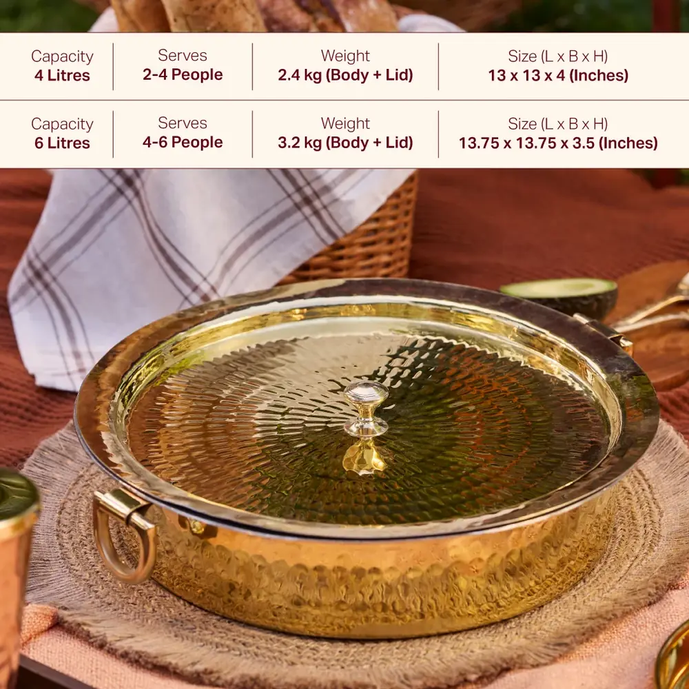 Brass lagaan with lid resting on a table with bread behind