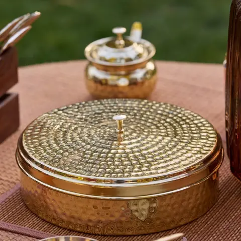 Closed spice box on an outdoor table