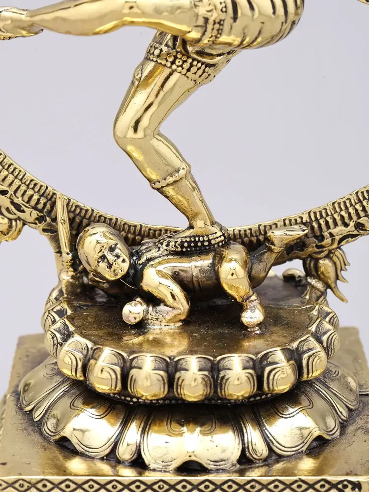 Close view of the lotus base and the figure below Shiva's foot