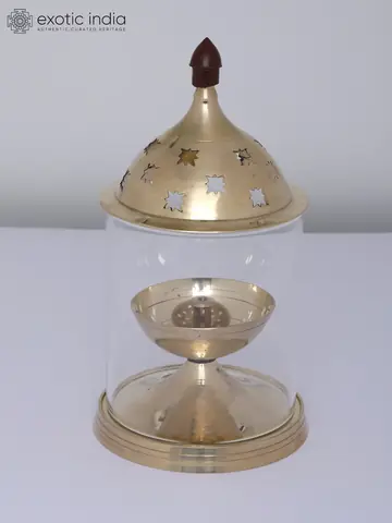 The brass oil bowl and base close up