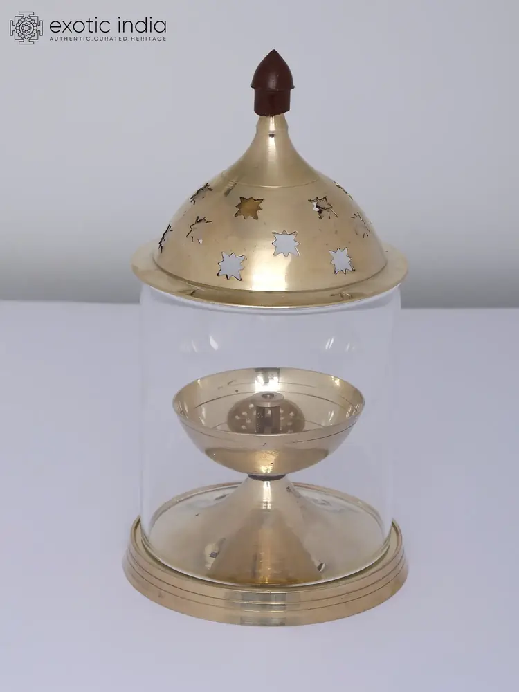 The brass oil bowl and base close up