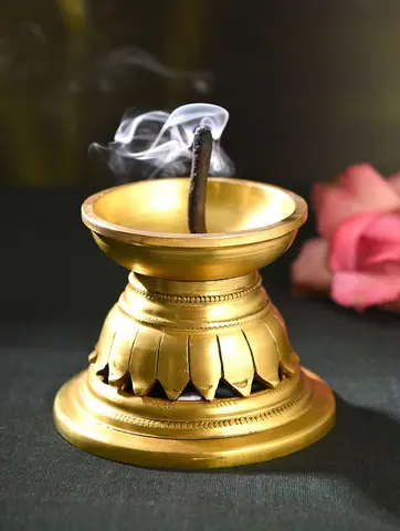 The piece with an incense stick and smoke