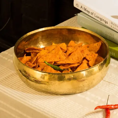 Bowl filled with snacks on a table