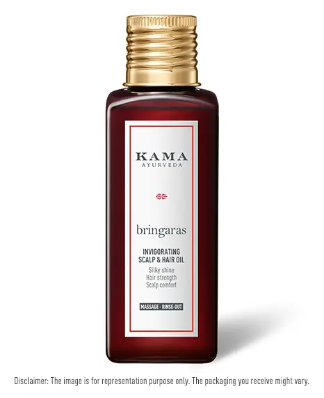 Gold-capped bottle of the Bringaras scalp and hair oil