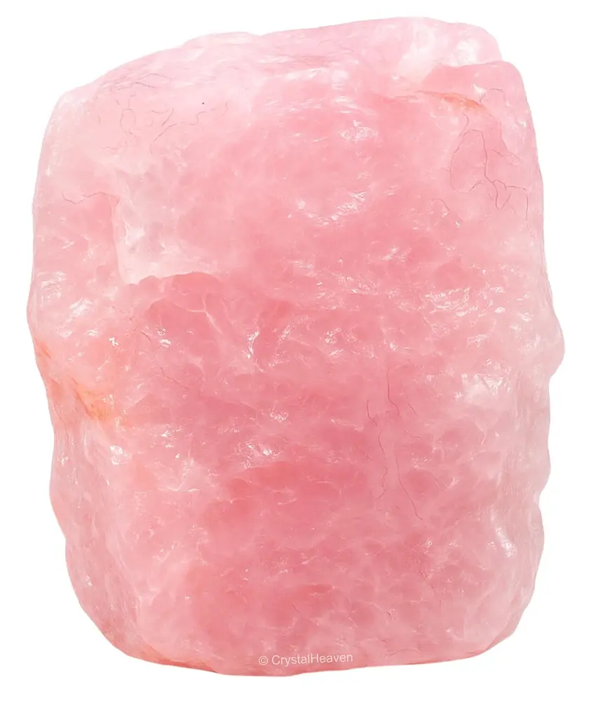 A single raw rose quartz chunk on white