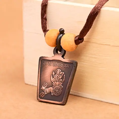 The deity side on a brown cord with two beads