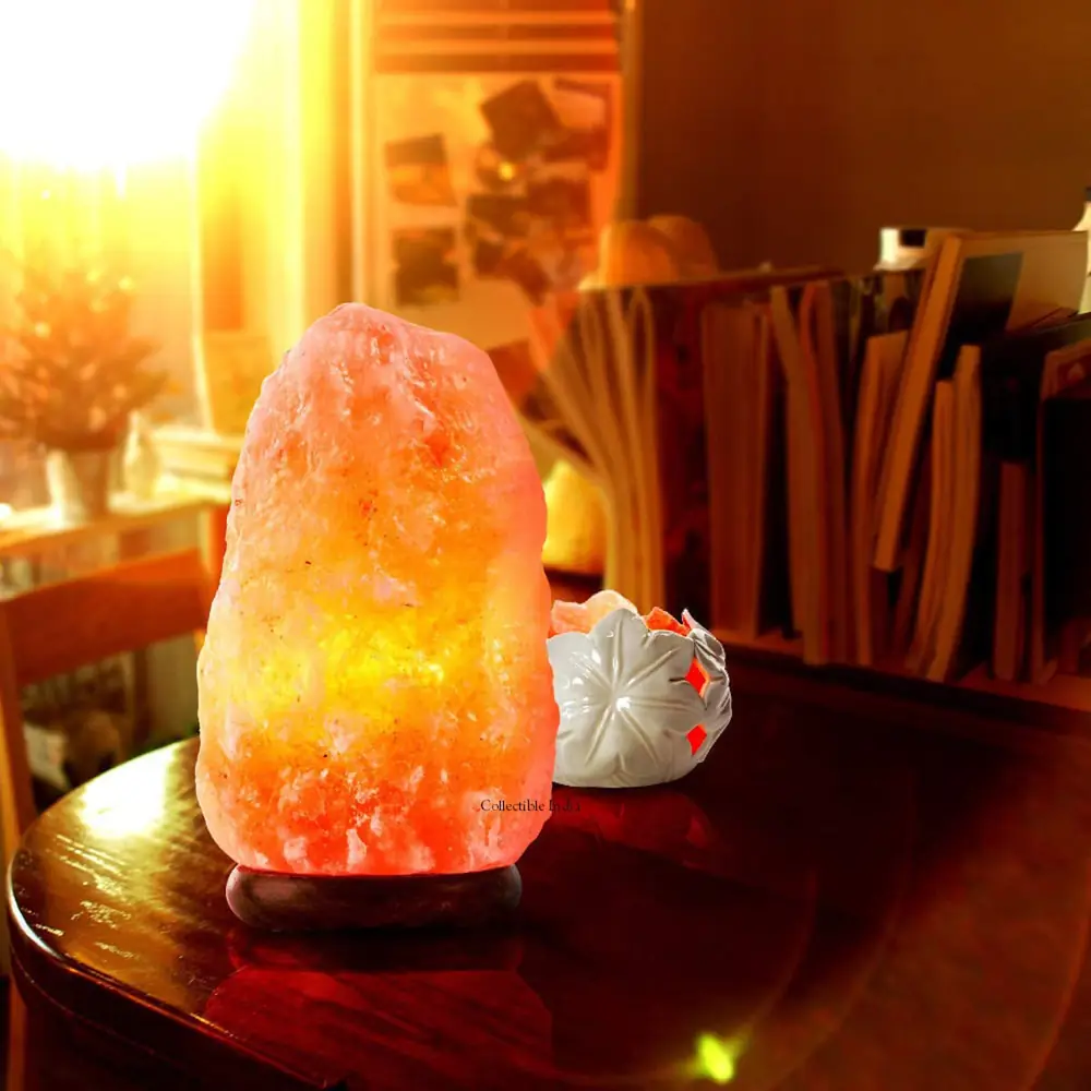 The salt lamp on white, unlit, with its wooden base