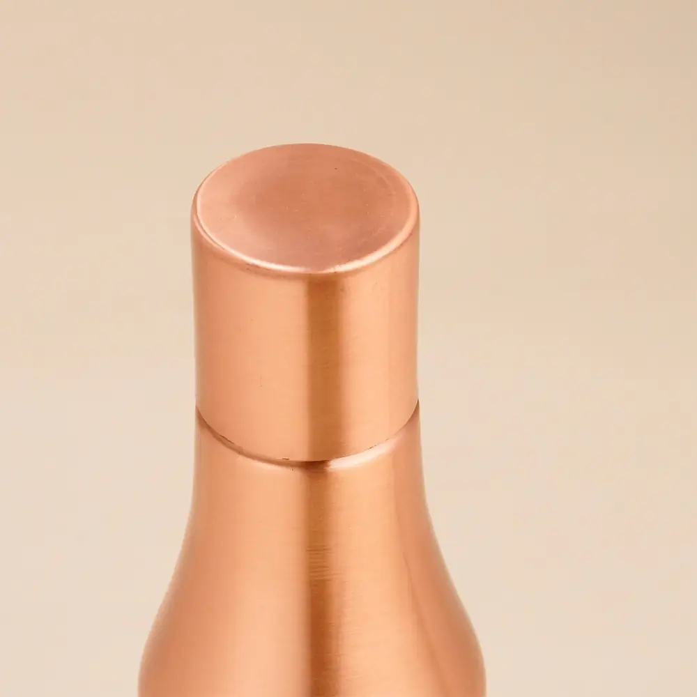 Close view of the bottle's cap and neck