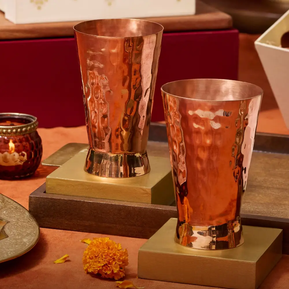 The glasses on a table with sweets and a small lamp