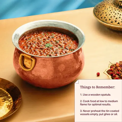The handi holding a red lentil curry