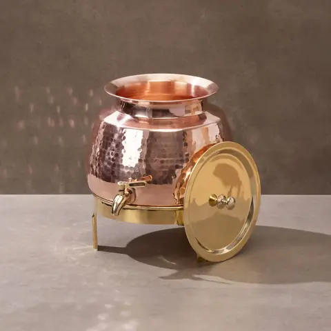 The dispenser with its lid lifted off