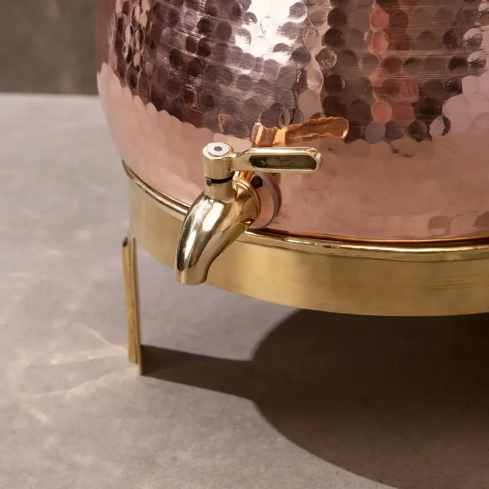 Close view of the tap and hammered surface