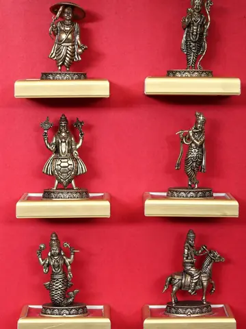 Close view of six figures on the red backdrop