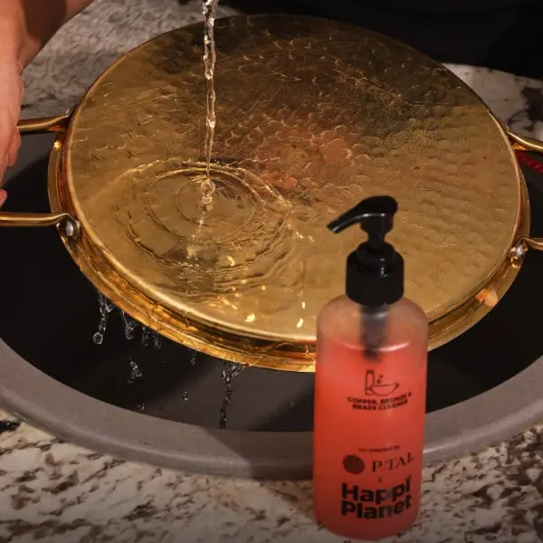 The pump bottle on a grey ground