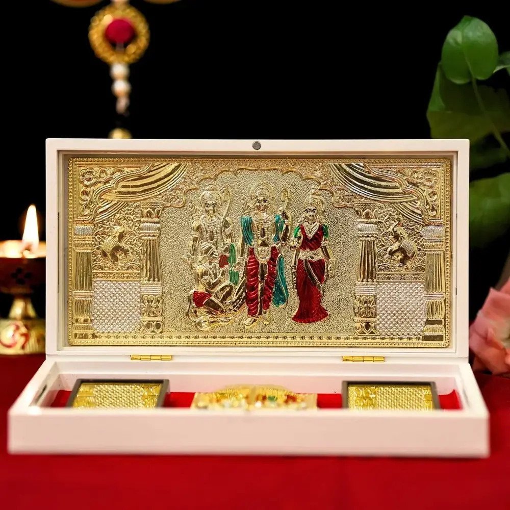 Ram Darbar pocket temple open, with gold panels in a white box lined in red
