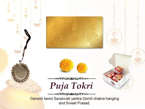 Puja Tokri card showing a yantra, a gomti chakra hanging and sweet prasad