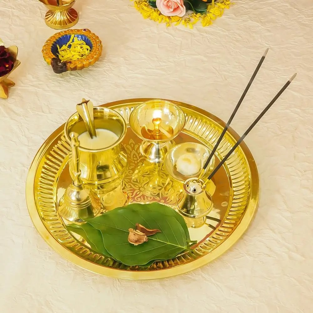The set with incense sticks and a leaf on the plate