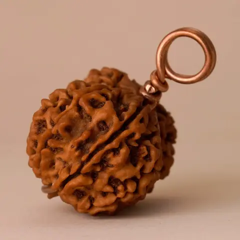 A single side of the bead with its copper loop