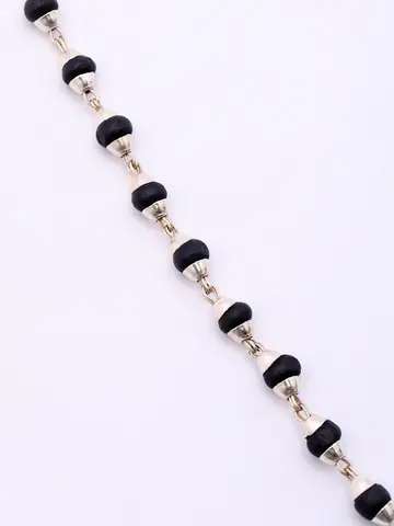 Close view of the black beads and silver fittings