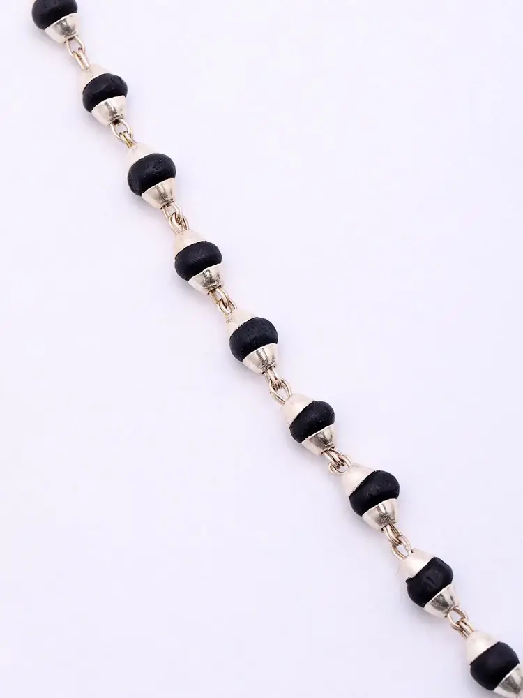 Close view of the black beads and silver fittings