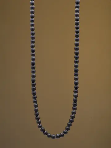 The mala on a dark cloth