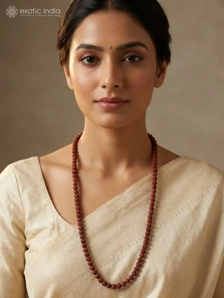 A model wearing the long rudraksha mala