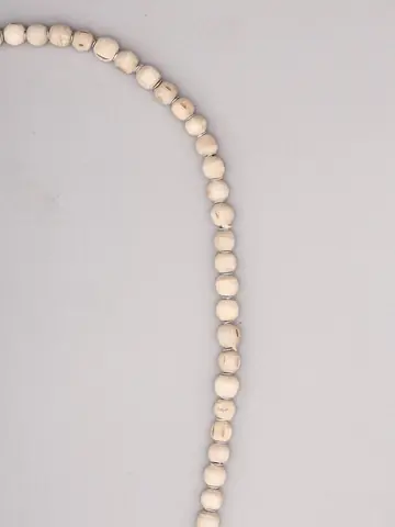 Close view of the pale round beads