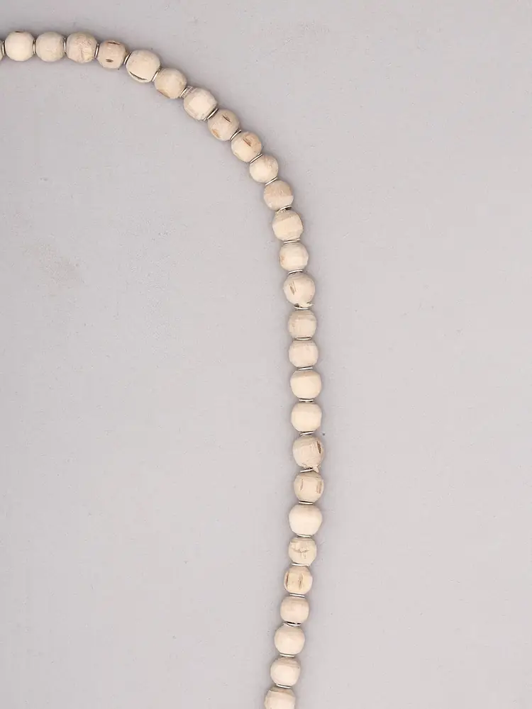 Close view of the pale round beads