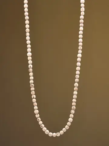 The mala on a dark cloth