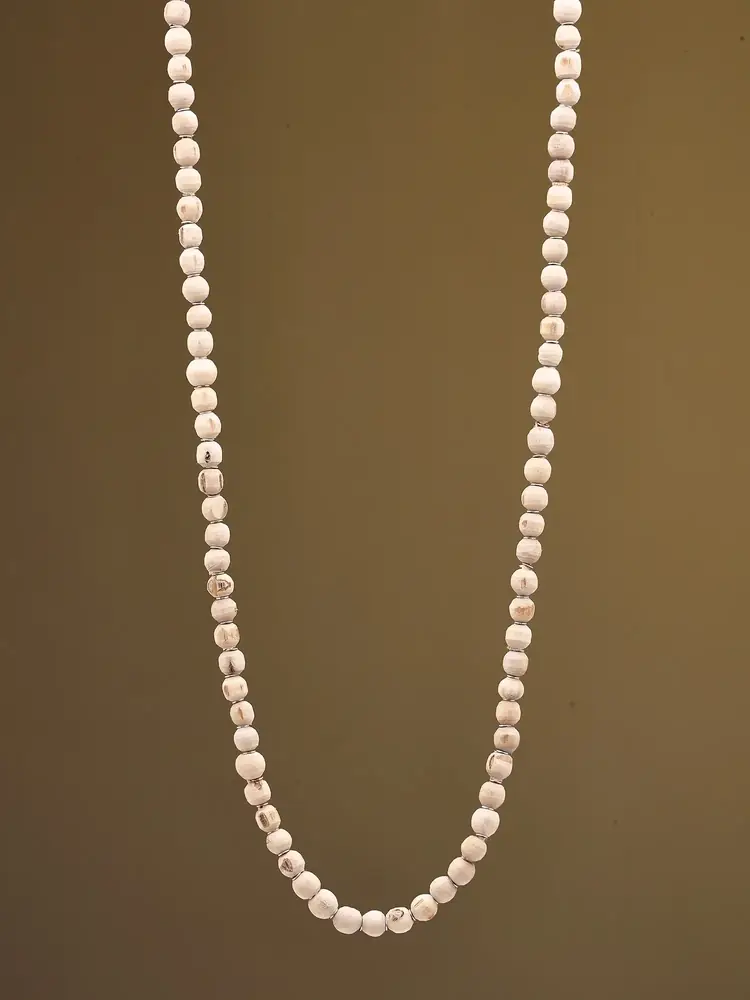 The mala on a dark cloth