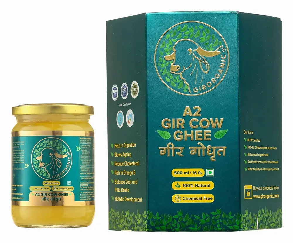 Glass jar of GirOrganic A2 ghee beside its green box
