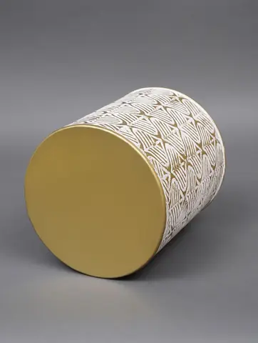 Planter on its side showing the gold base