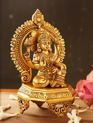Three quarter view of the idol on its base