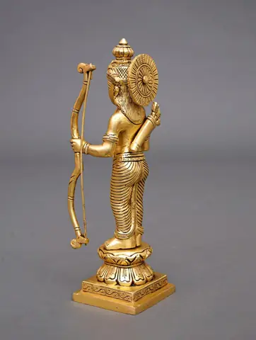 The idol seen from behind with a round disc