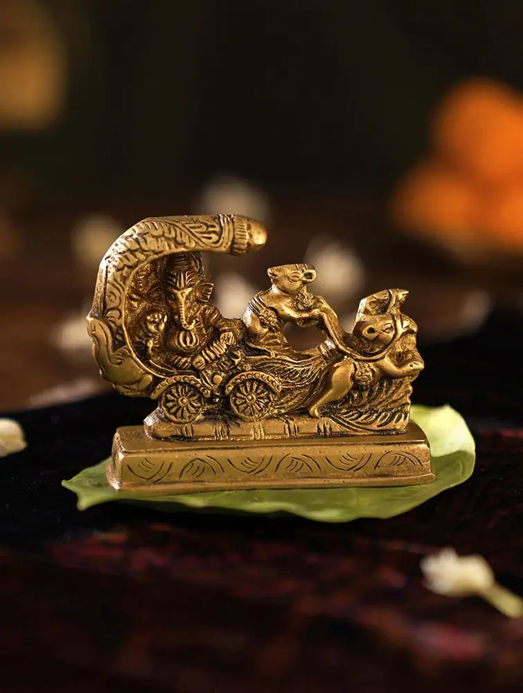 Close view of the figure and animals pulling the chariot