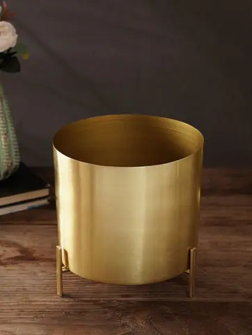 The planter on its stand without a plant