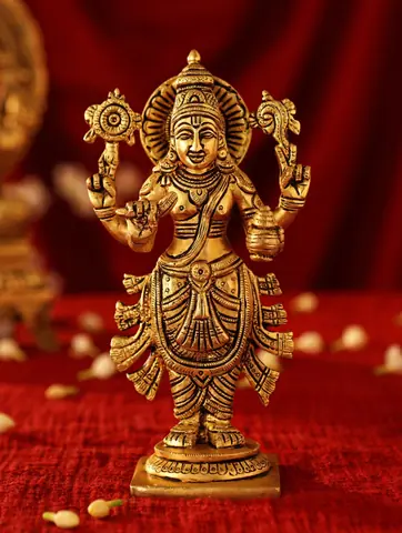 The idol against a red backdrop