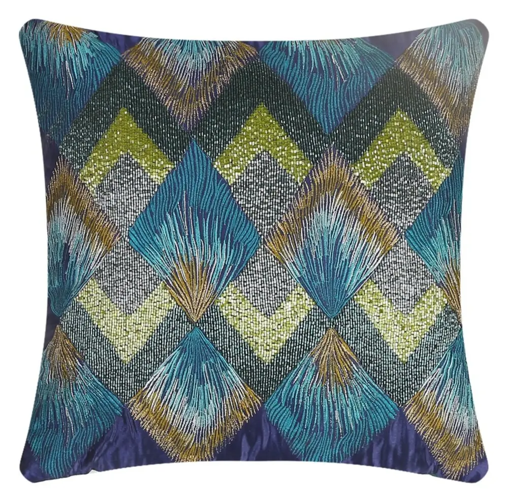 Teal cushion cover with gold and green embroidered diamonds