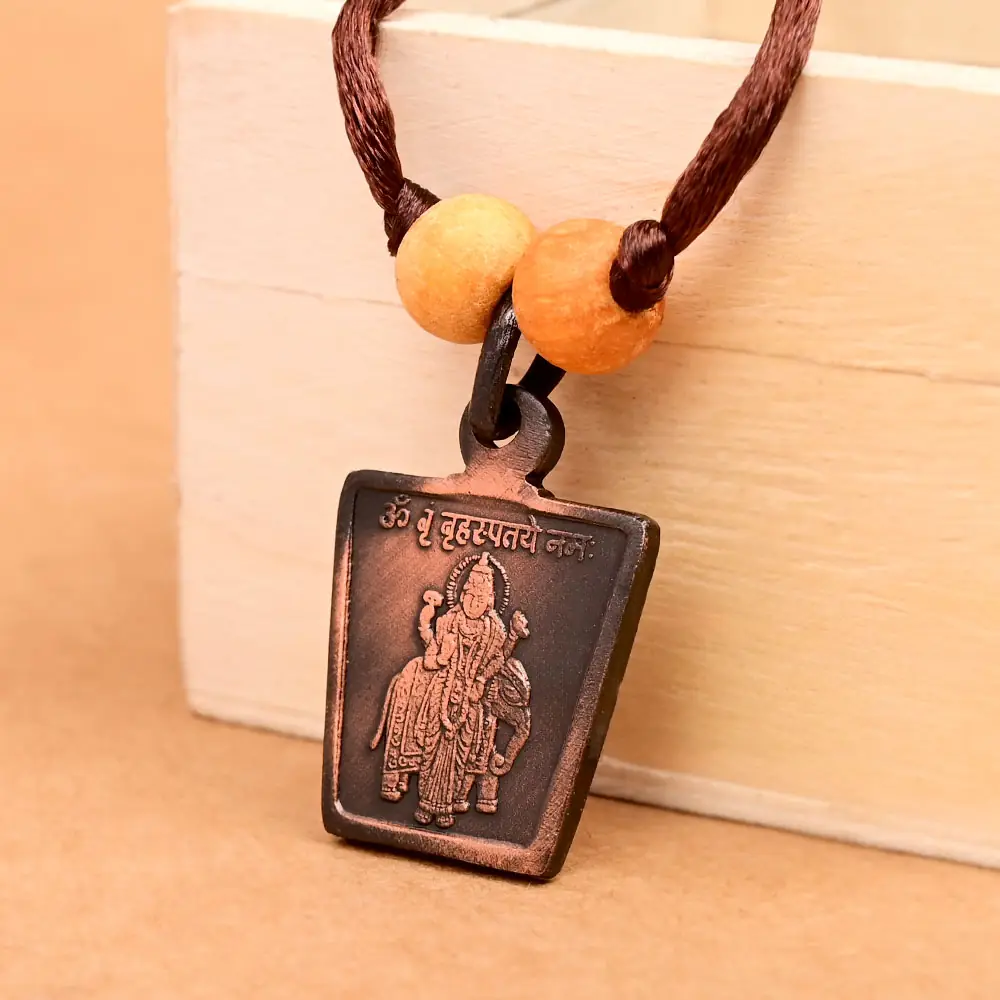 The deity side on a brown cord with two beads
