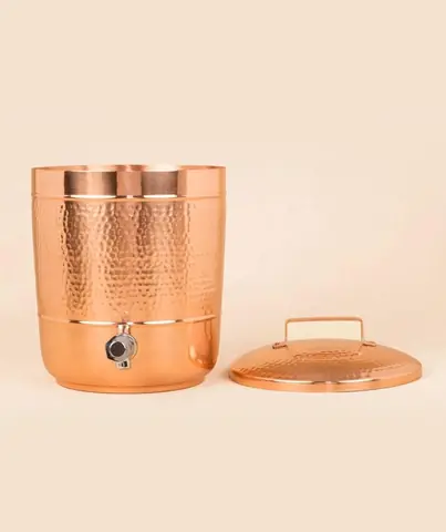 The pot with its lid lifted off and set beside it