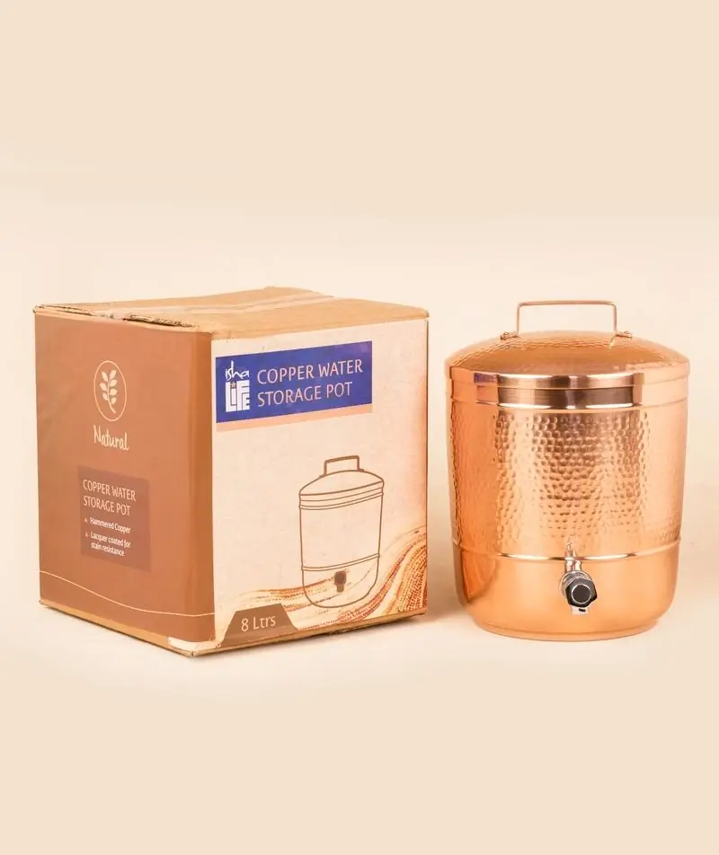 The pot shown next to its packaging box
