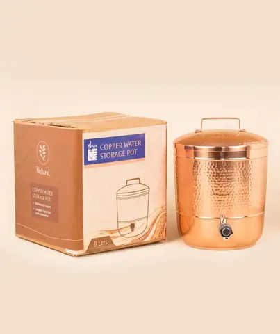 The pot next to its packaging box