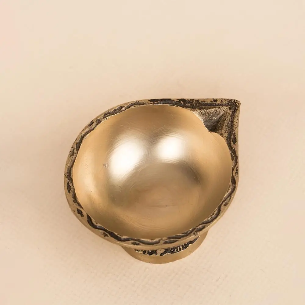 Brass diya seen from above